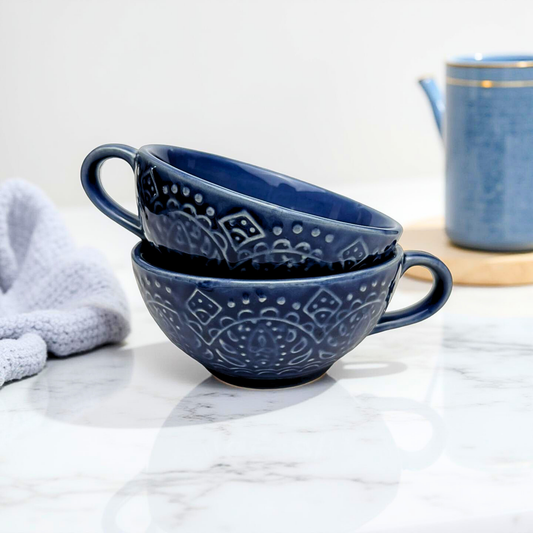 Two blue ceramic cups with spoons on a wooden table
Soup cup set
blue soup cup set of 2